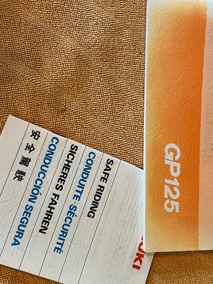 Suzuki GP125 Fahrer-Handbuch / Owner's Manual