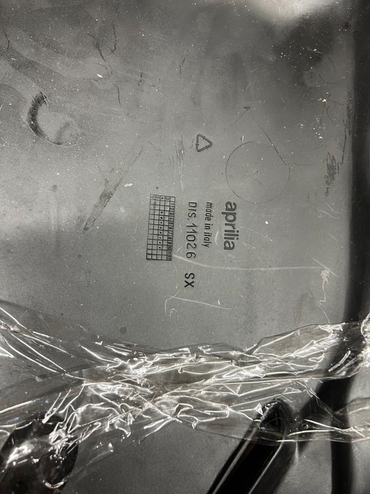 Aprilia RX 125 2 Takt Seitendeckel links neu dis11026