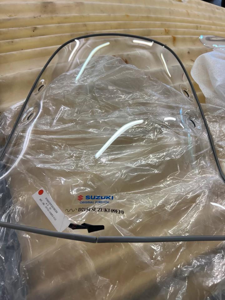 Suzuki AP50 Verkleidungsscheibe Windschild neu 99750-09EF0-010