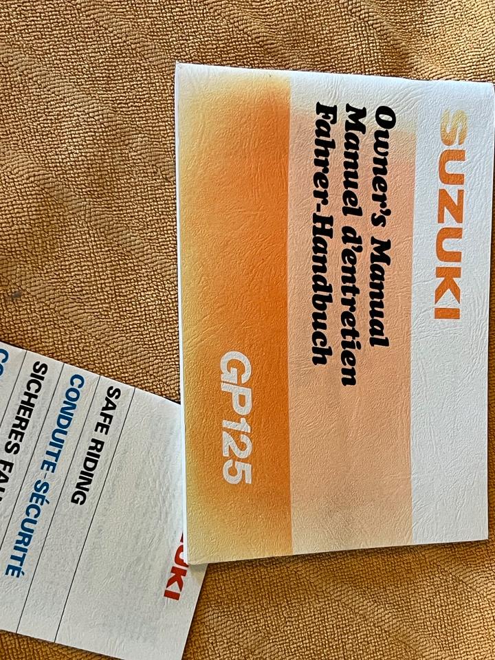 Suzuki GP125 Fahrer-Handbuch / Owner's Manual