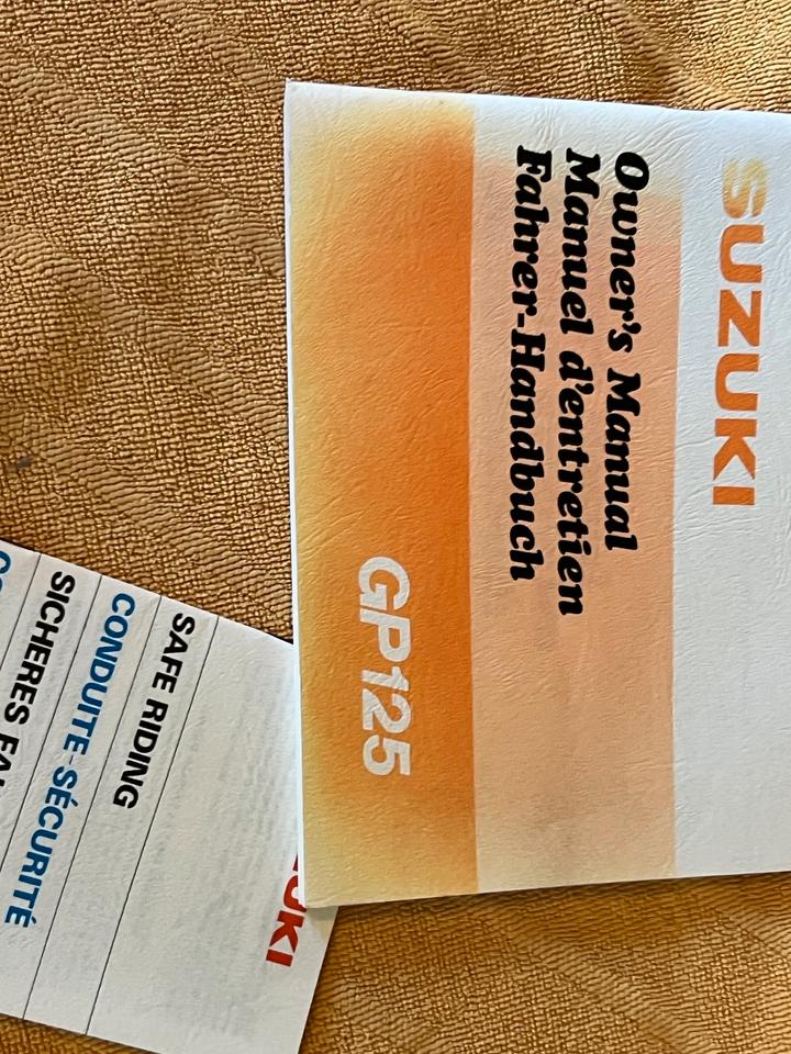 Suzuki GP125 Fahrer-Handbuch / Owner's Manual