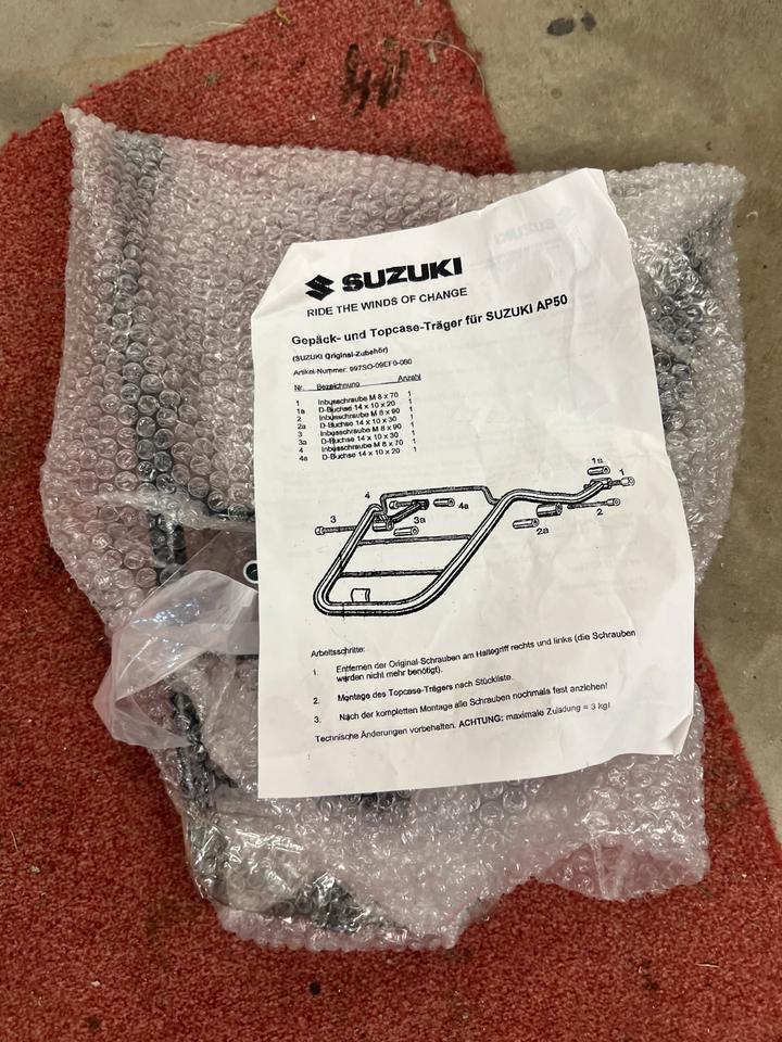 Suzuki AP 50 Gepäck Träger topcase Träger 97S0-09EF0-060 neu